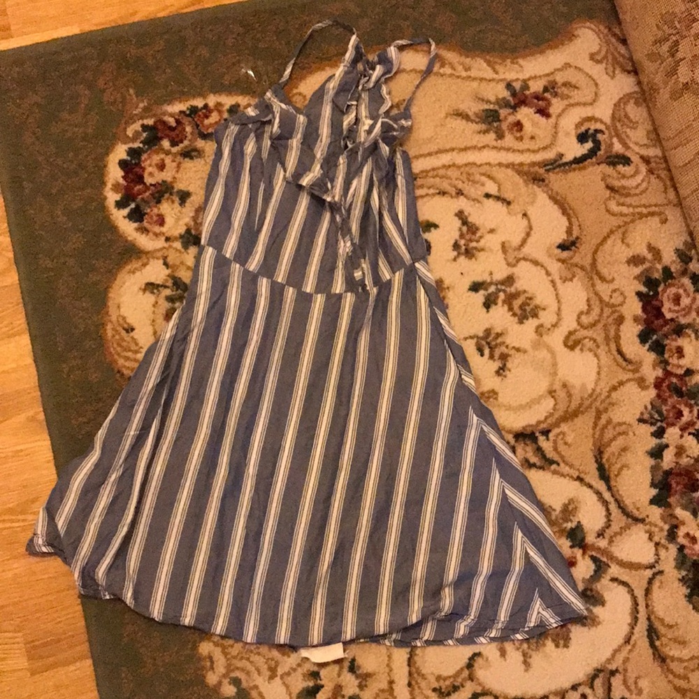 Socialite blue dress with neckline on the back and zipper on the side,new size S
